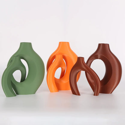 A set of 2 Bohemian-chic round plastic vases