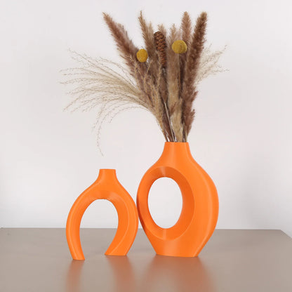A set of 2 Bohemian-chic round plastic vases