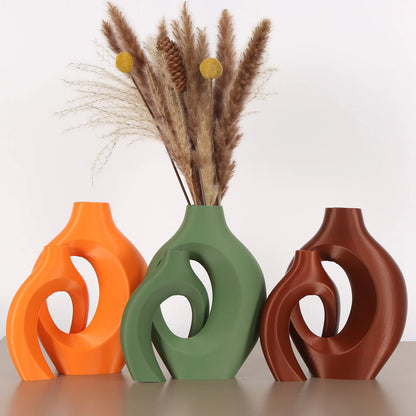 A set of 2 Bohemian-chic round plastic vases